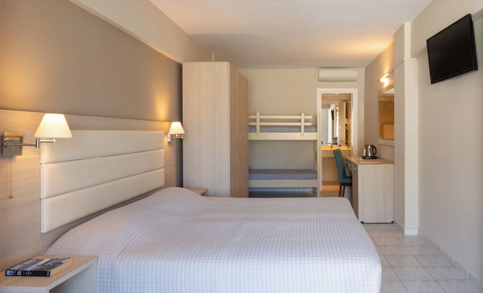 Quadruple Room, Garden View | Free WiFi, bed sheets