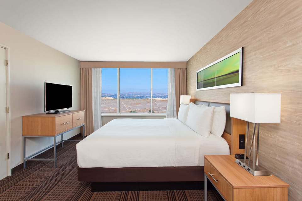 In-room safe, desk, laptop workspace, iron/ironing board