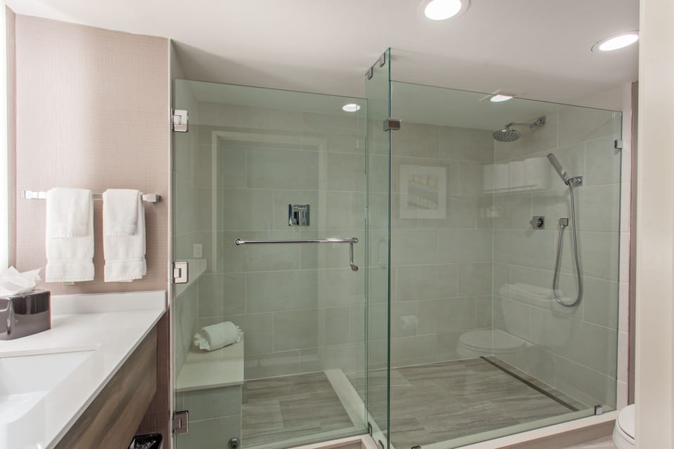 Suite, 1 Bedroom | Bathroom | Shower, free toiletries, hair dryer, towels