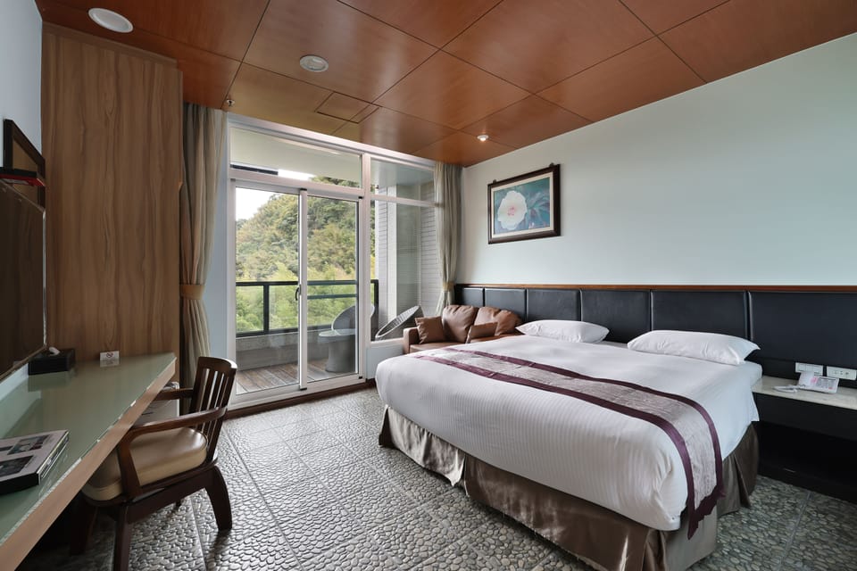 Deluxe Double Room | Down comforters, blackout drapes, free WiFi, bed sheets