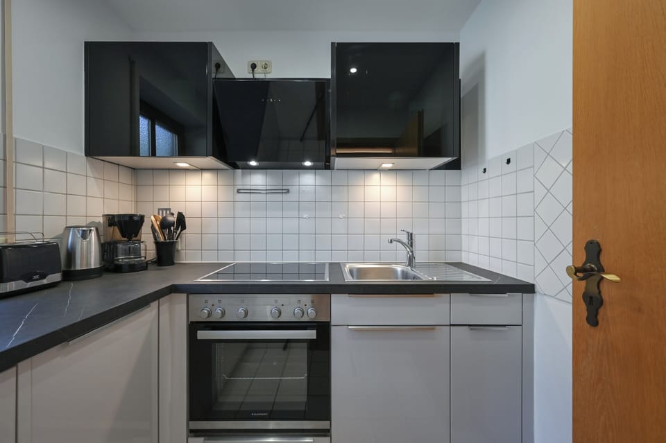 Junior Apartment, 2 Twin Beds (small) | Private kitchen | Full-size fridge, dishwasher, cleaning supplies