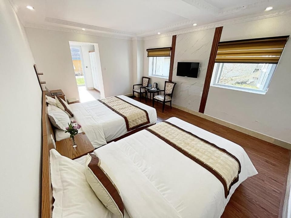 Deluxe Triple Room | Pillowtop beds, free minibar items, iron/ironing board, free WiFi