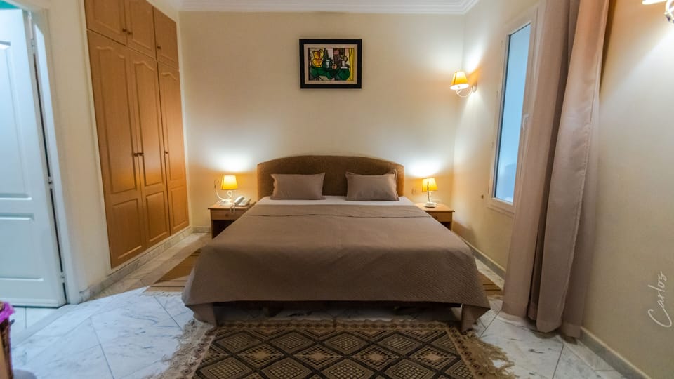 Double or Twin Room | Minibar, in-room safe, blackout drapes, soundproofing