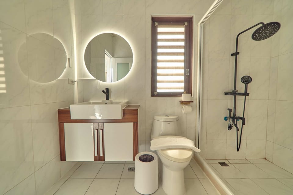 Family Cabin, Multiple Beds, Ocean View | Bathroom | Shower, rainfall showerhead, designer toiletries, hair dryer