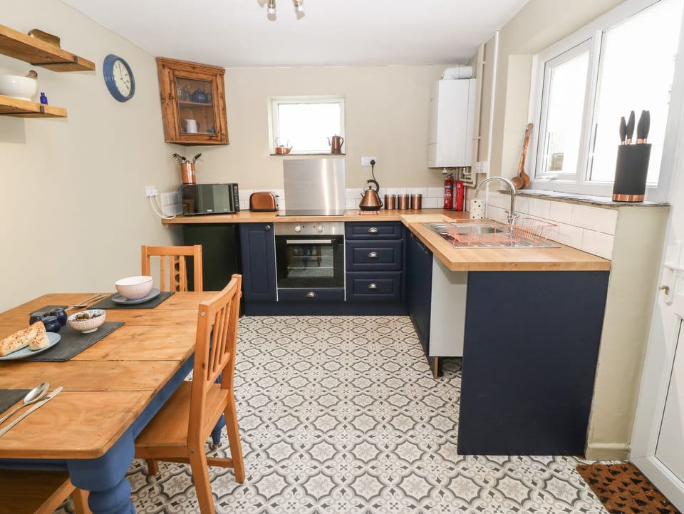 Fridge, electric kettle, toaster, cookware/dishes/utensils