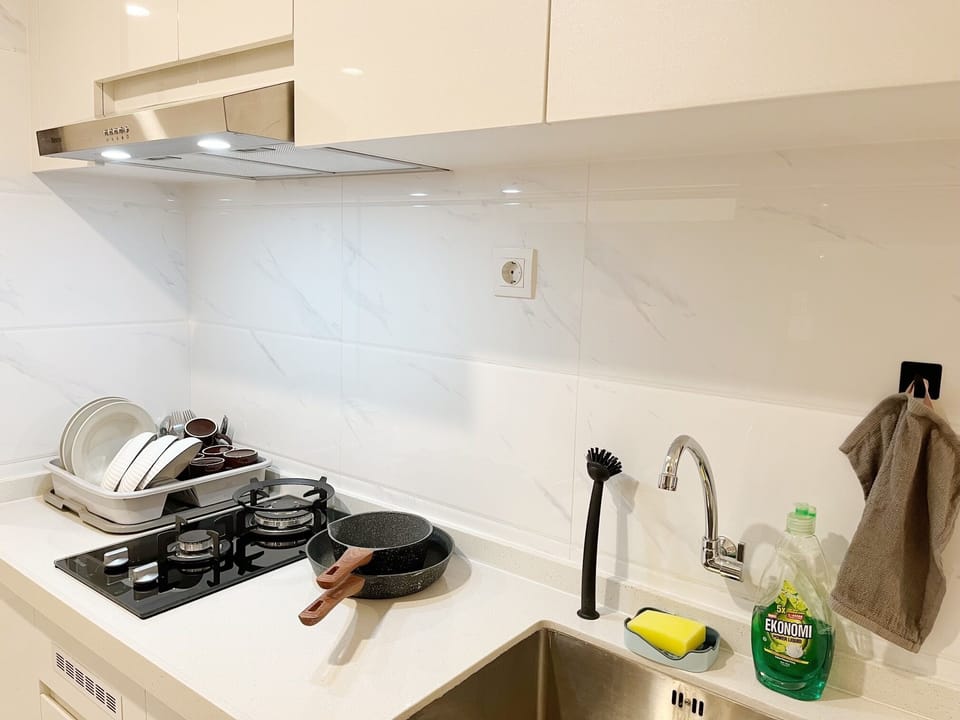 Family Apartment, 3 Bedrooms, Garden View | Private kitchen | Full-size fridge, microwave, stovetop, cookware/dishes/utensils