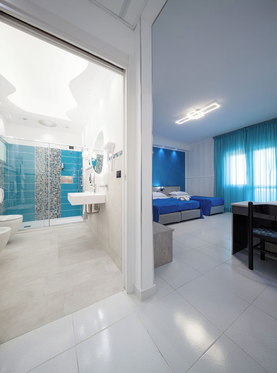 Junior Studio Suite, Sea View | Minibar, desk, laptop workspace, cribs/infant beds