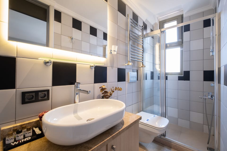 Family Condo | Bathroom | Shower, hydromassage showerhead, designer toiletries, hair dryer