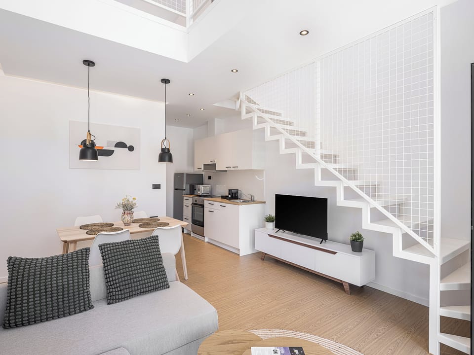 Deluxe Suite, 1 Queen Bed with Sofa bed, Pool View | Living area | 43-inch Smart TV with digital channels, TV, Netflix