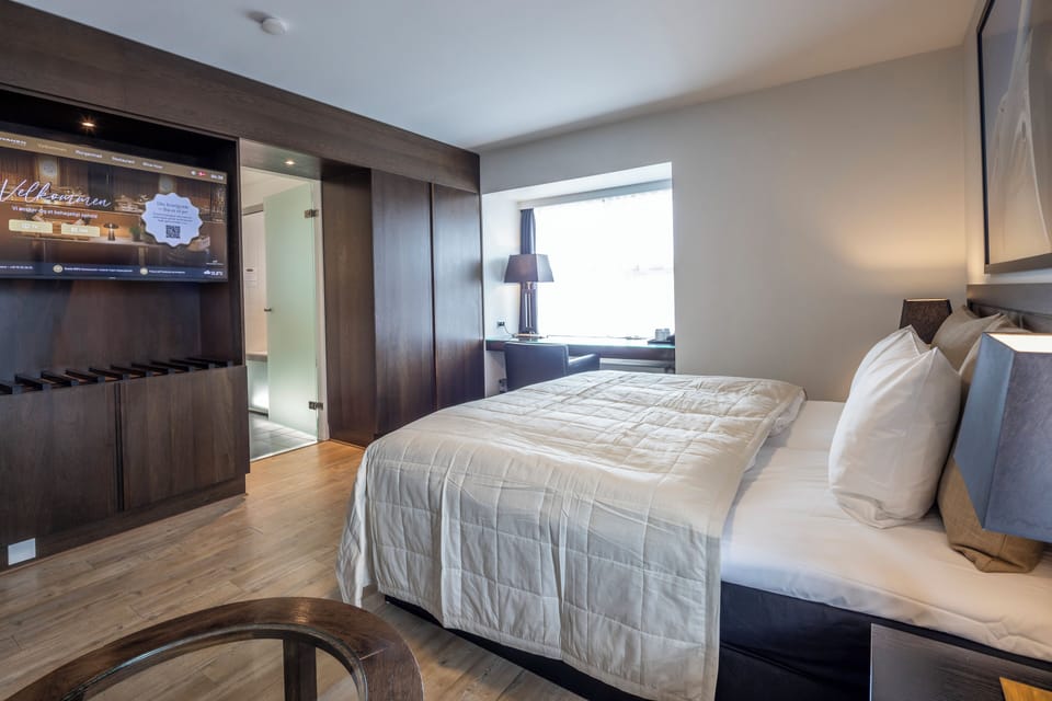 Pillowtop beds, laptop workspace, blackout drapes, cribs/infant beds