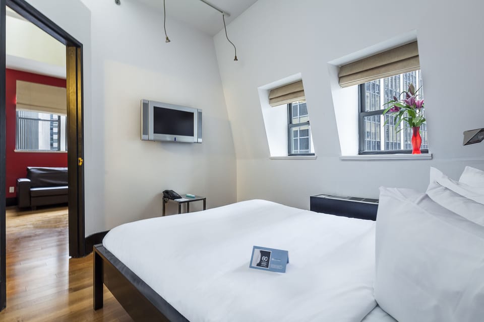 Junior Suite, 1 Bedroom | Minibar, in-room safe, iron/ironing board, free cribs/infant beds