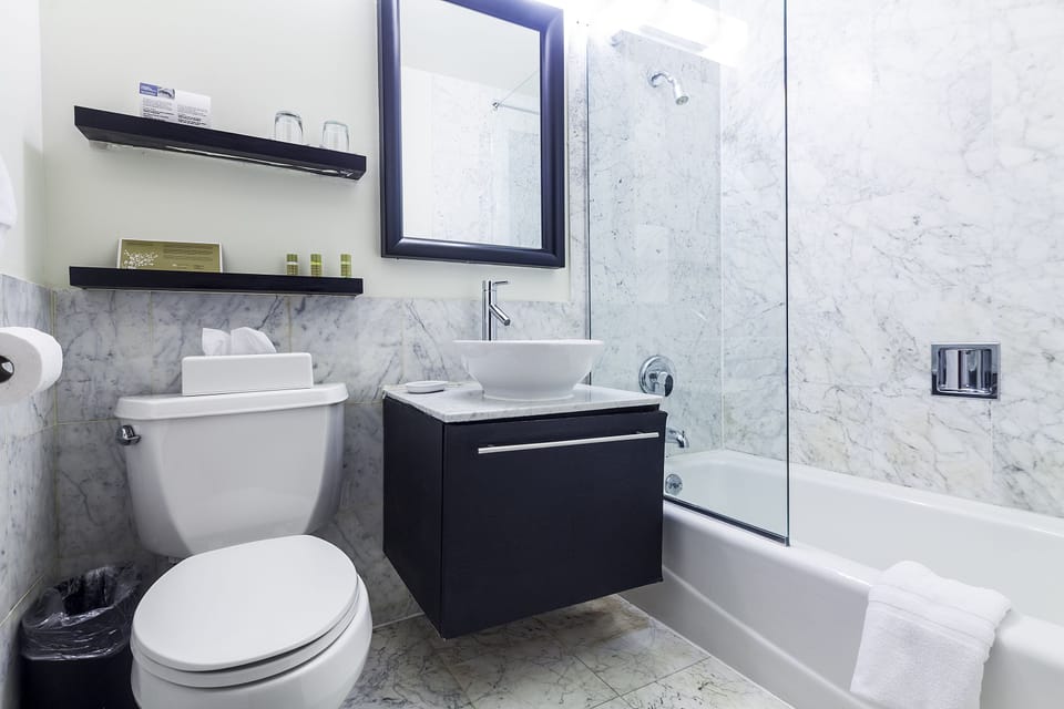 Combined shower/tub, eco-friendly toiletries, hair dryer, towels