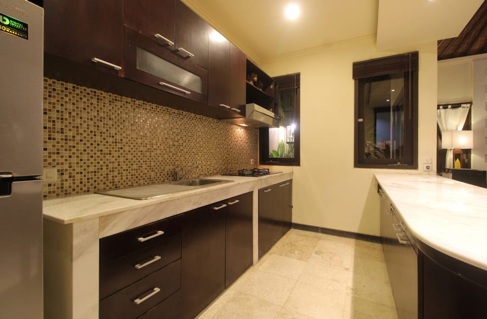 Exclusive Villa | Private kitchen | Fridge, microwave, coffee/tea maker, electric kettle