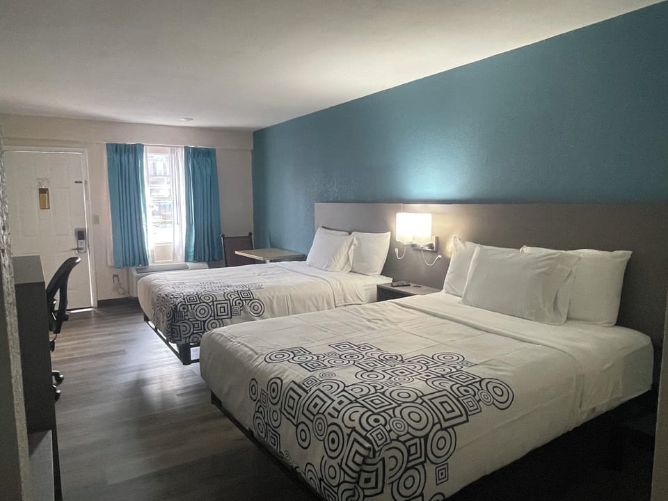 Standard Room, 2 Queen Beds, Non Smoking | Blackout drapes, iron/ironing board, bed sheets