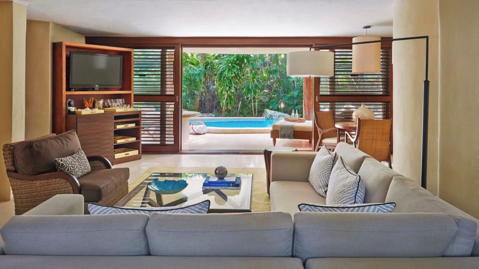 Ocean View Two Level Villa with Large Private Pool | Living area | 42-inch flat-screen TV with satellite channels, TV, DVD player