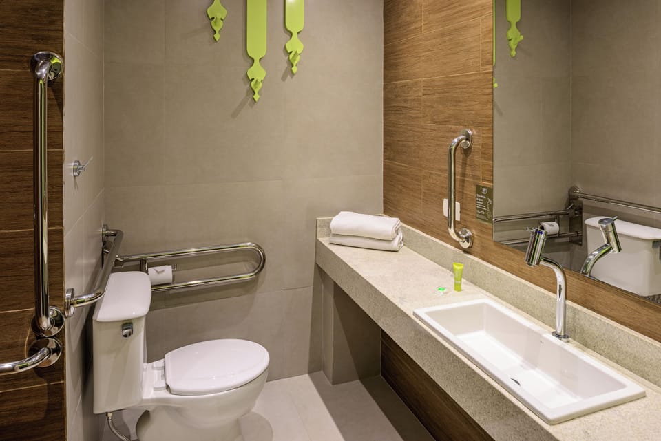 Shower, eco-friendly toiletries, hair dryer, towels