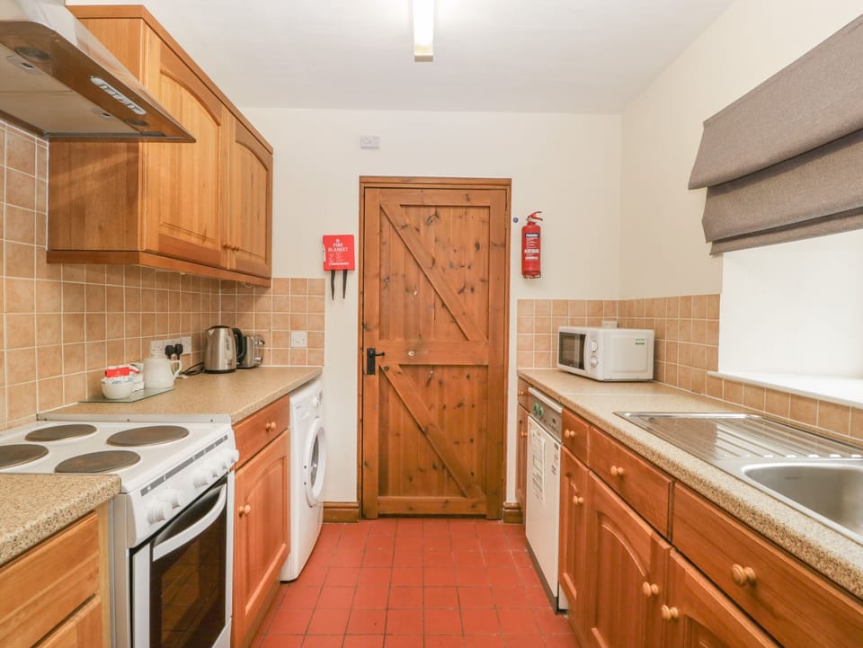 Fridge, electric kettle, toaster, cookware/dishes/utensils
