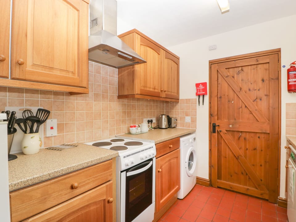 Fridge, electric kettle, toaster, cookware/dishes/utensils
