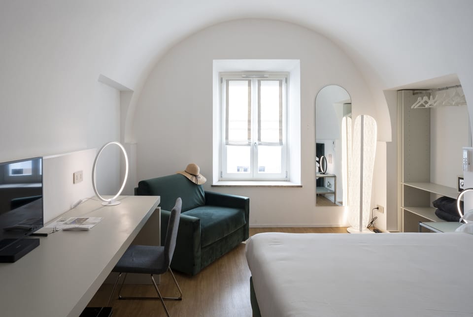 Room | Down comforters, minibar, in-room safe, desk
