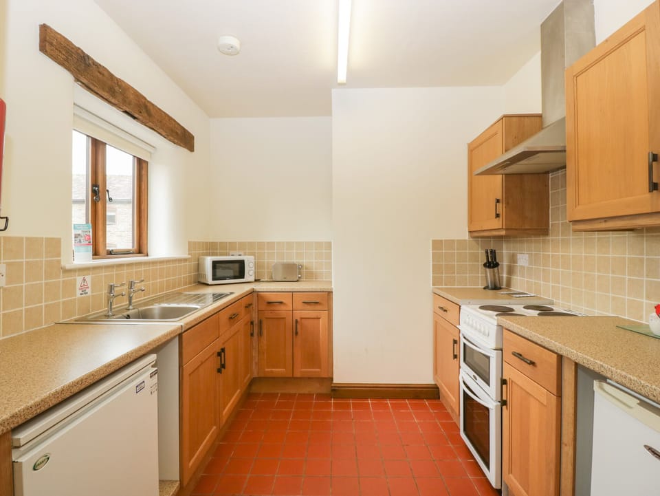 Fridge, electric kettle, toaster, cookware/dishes/utensils