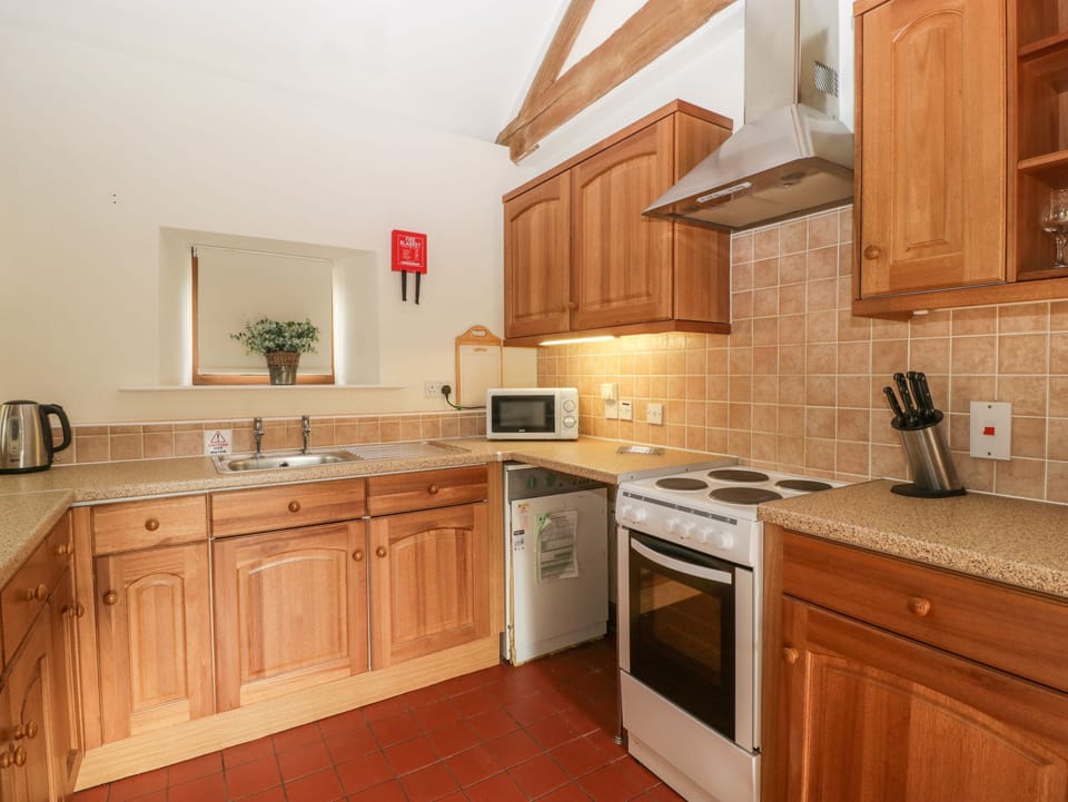 Fridge, electric kettle, toaster, cookware/dishes/utensils