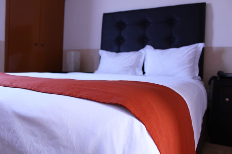 Standard Room, 1 Double Bed | Desk, laptop workspace, WiFi (free), bed sheets