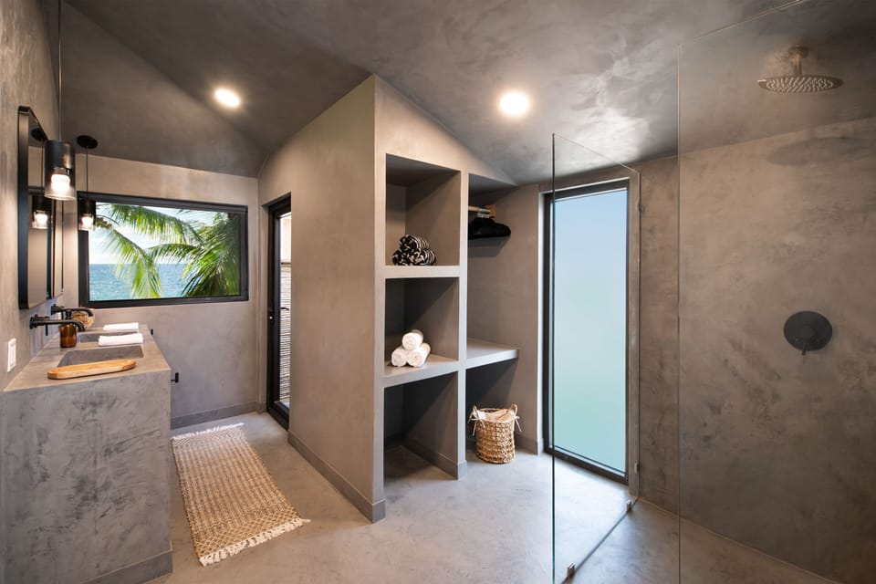 Shower, rainfall showerhead, towels, soap