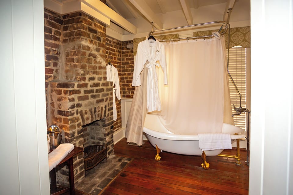 The Carriage House (Queen) | Bathroom | Designer toiletries, hair dryer, bathrobes, towels