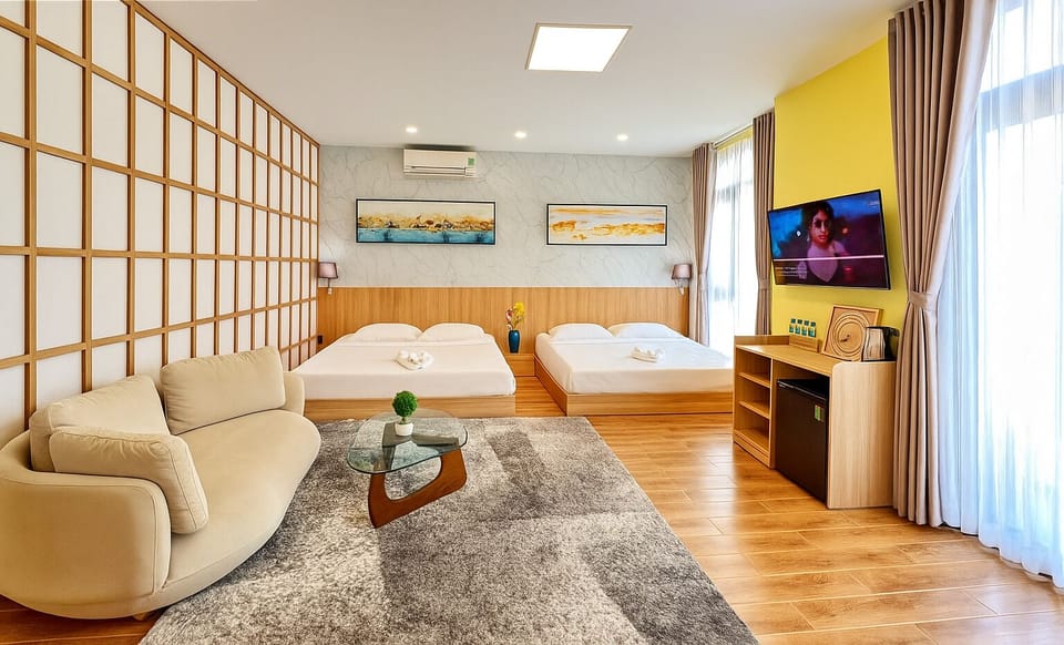 Deluxe Quadruple Room | Egyptian cotton sheets, premium bedding, memory foam beds, minibar
