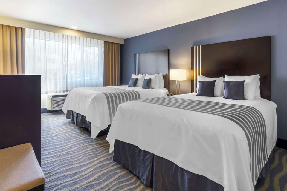 Premium bedding, pillowtop beds, desk, laptop workspace