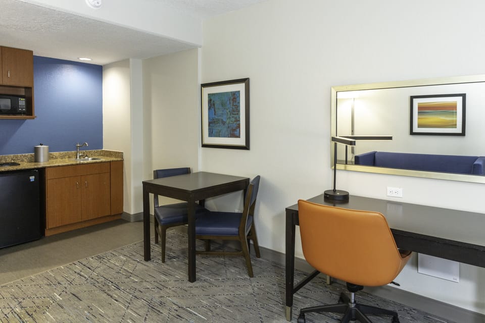 Suite, 1 King Bed (Garden Tub) | Pillowtop beds, in-room safe, desk, blackout drapes
