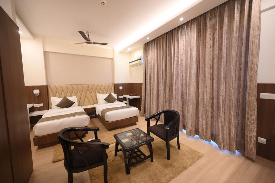 In-room safe, laptop workspace, WiFi (free), bed sheets