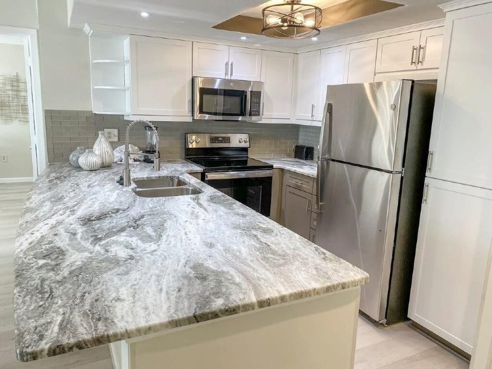 Condo, 2 Bedrooms | Private kitchen | Coffee/tea maker, fridge, oven, toaster