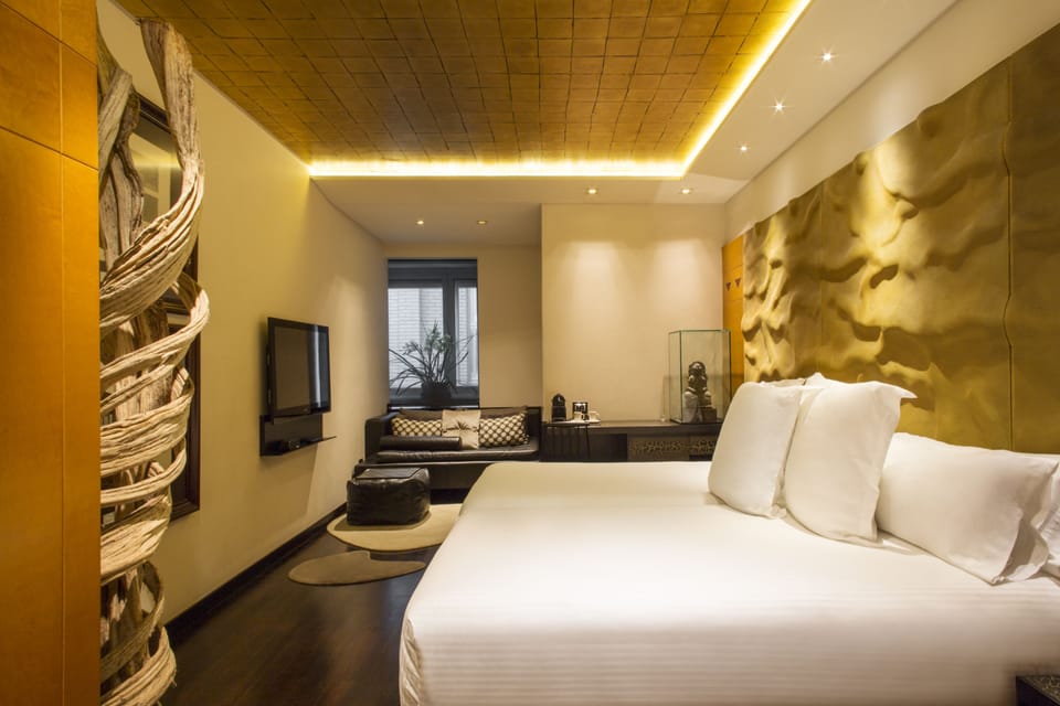 Egyptian cotton sheets, premium bedding, down comforters, minibar