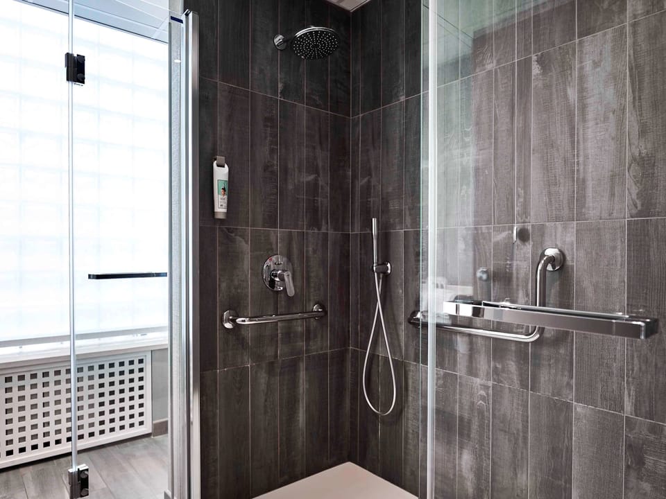 Shower, rainfall showerhead, eco-friendly toiletries, hair dryer