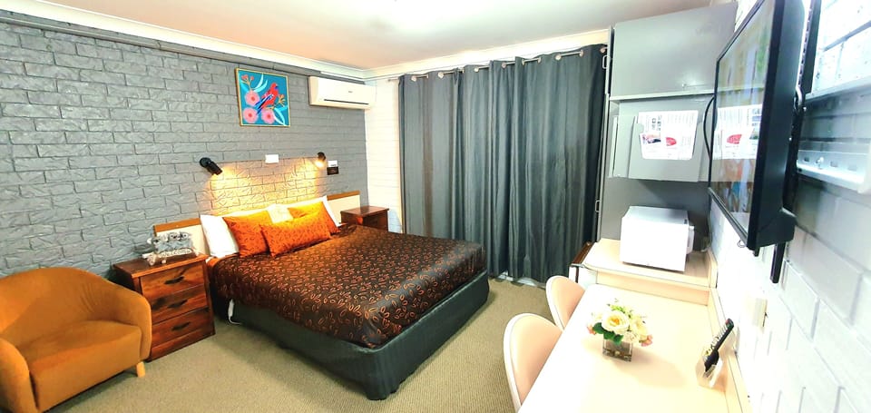 Premium bedding, desk, laptop workspace, soundproofing