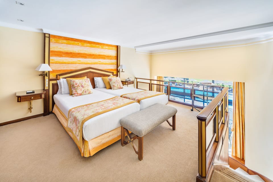 Garden Duplex Suite | Minibar, in-room safe, desk, soundproofing