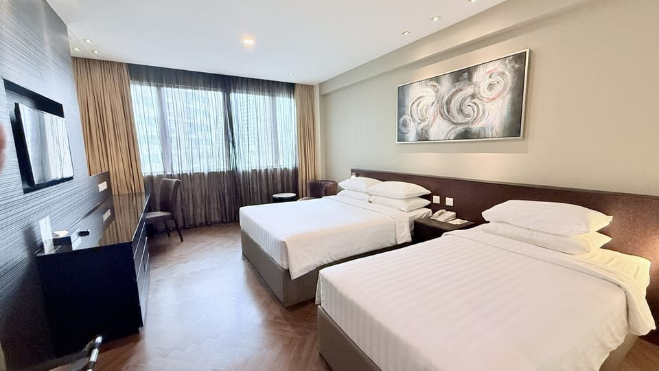 Family Room - 1 Double Bed and 1 Single Bed | Down comforters, pillowtop beds, minibar, in-room safe