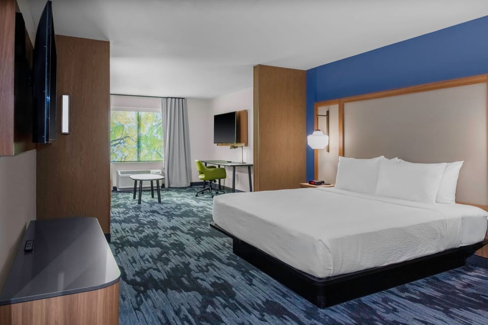 Premium bedding, pillowtop beds, desk, laptop workspace