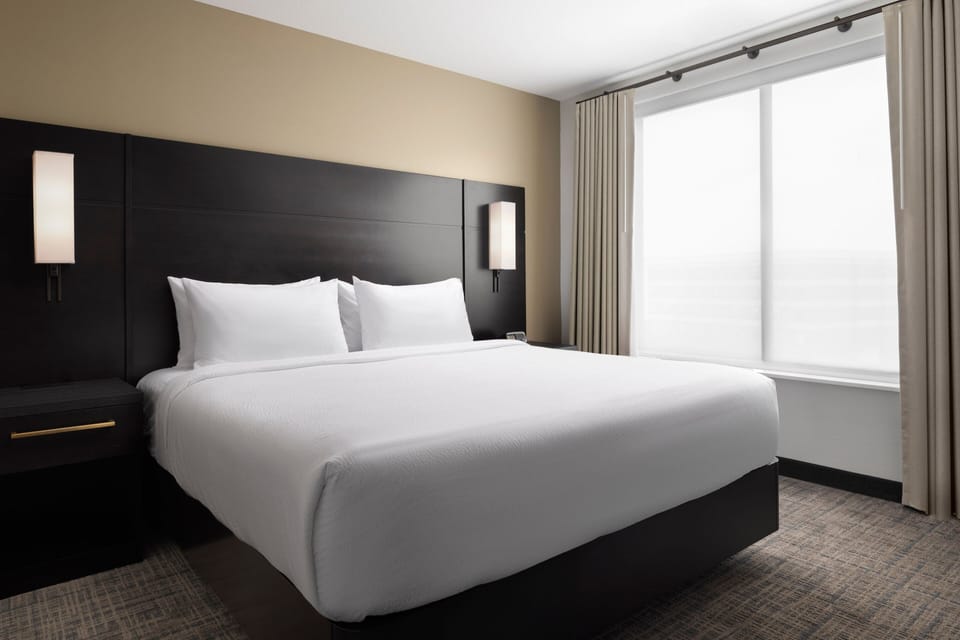 Premium bedding, down comforters, pillowtop beds, desk