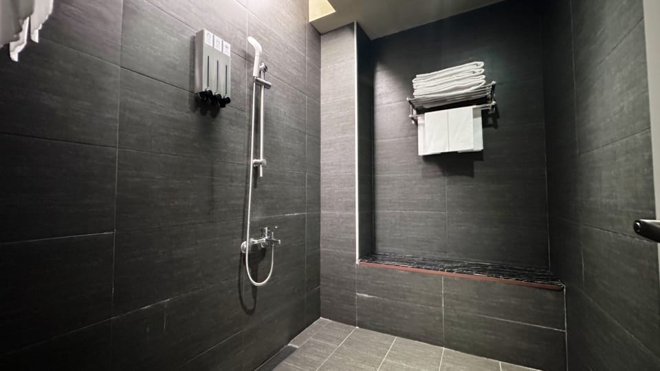 Japanese-style Quadruple Room | Bathroom | Rainfall showerhead, hair dryer, slippers, towels