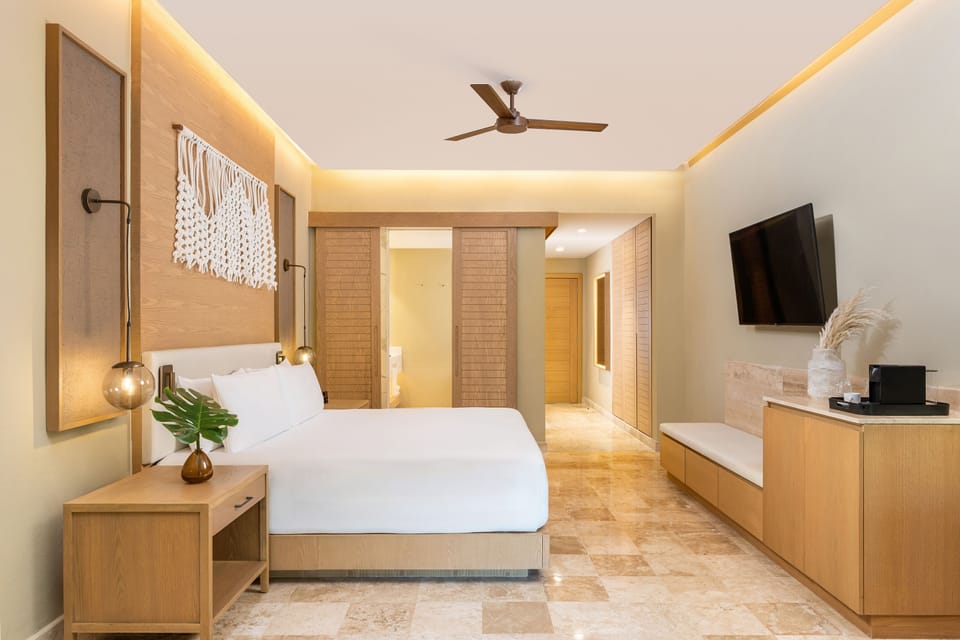 Premium bedding, down comforters, free minibar, in-room safe