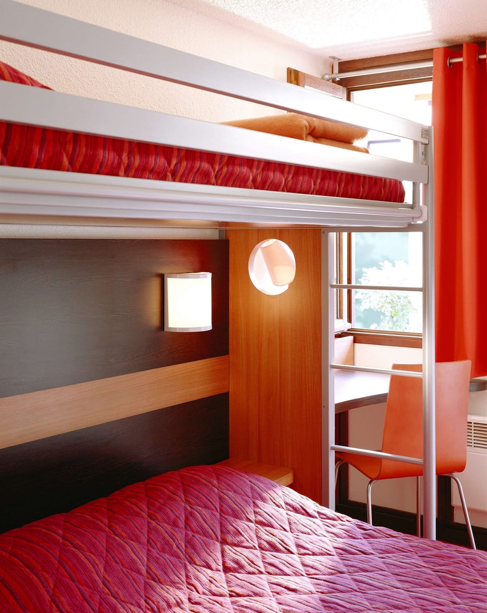 Desk, blackout drapes, iron/ironing board, free WiFi