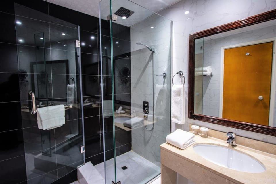 Combined shower/tub, hair dryer, bathrobes, slippers