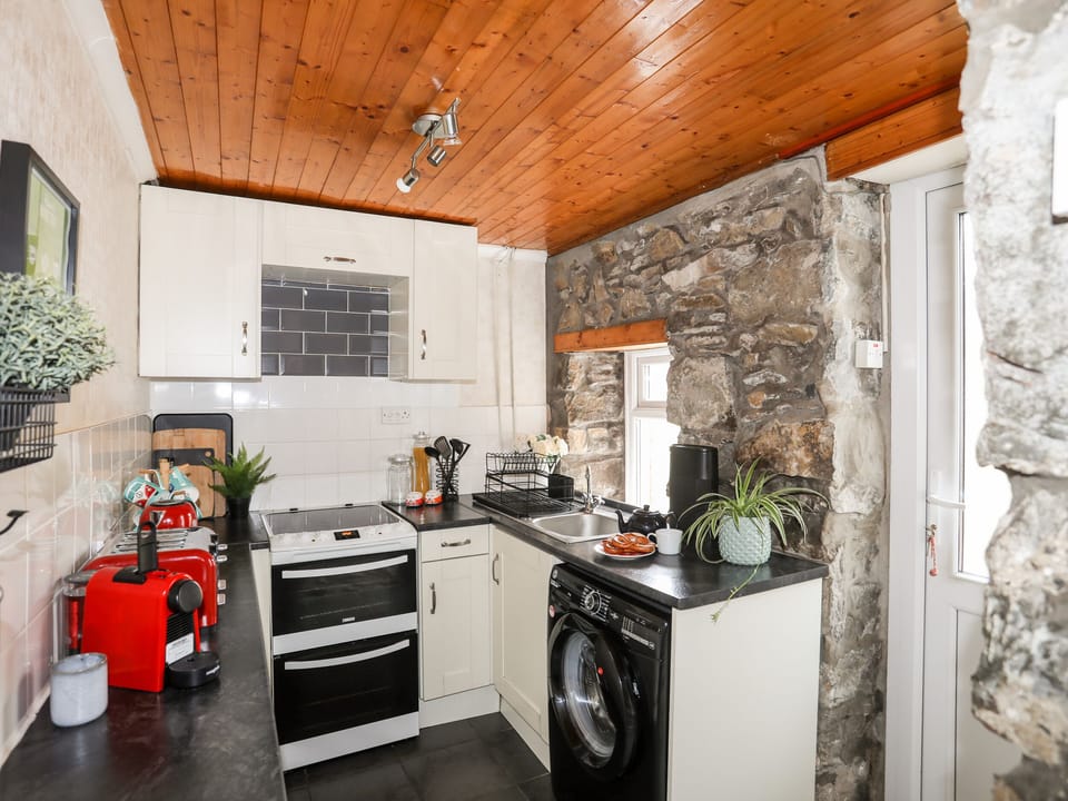 Fridge, electric kettle, toaster, cookware/dishes/utensils