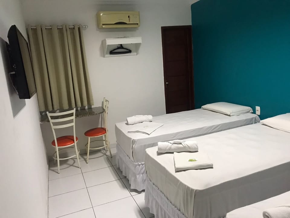 Comfort Triple Room | Laptop workspace, blackout drapes, iron/ironing board, free WiFi