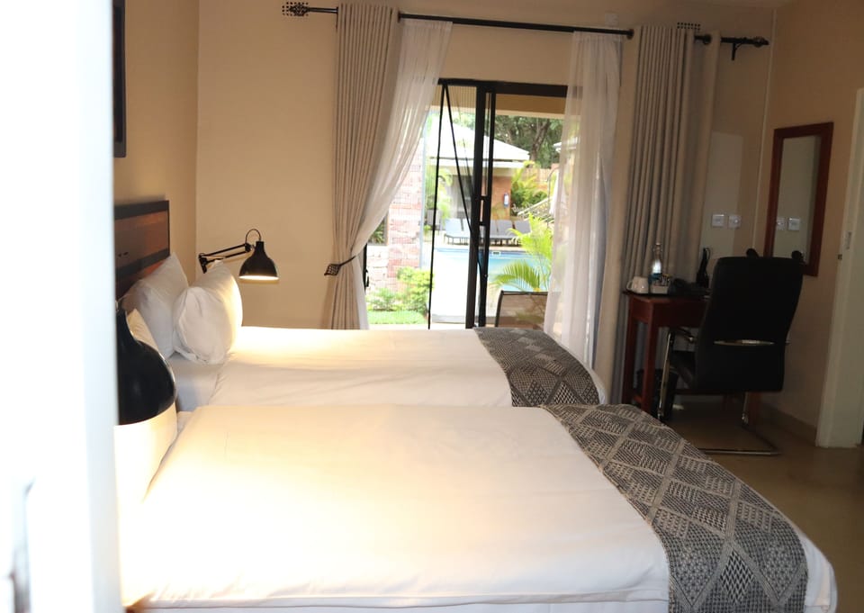 Standard Twin Room | In-room safe, individually decorated, individually furnished