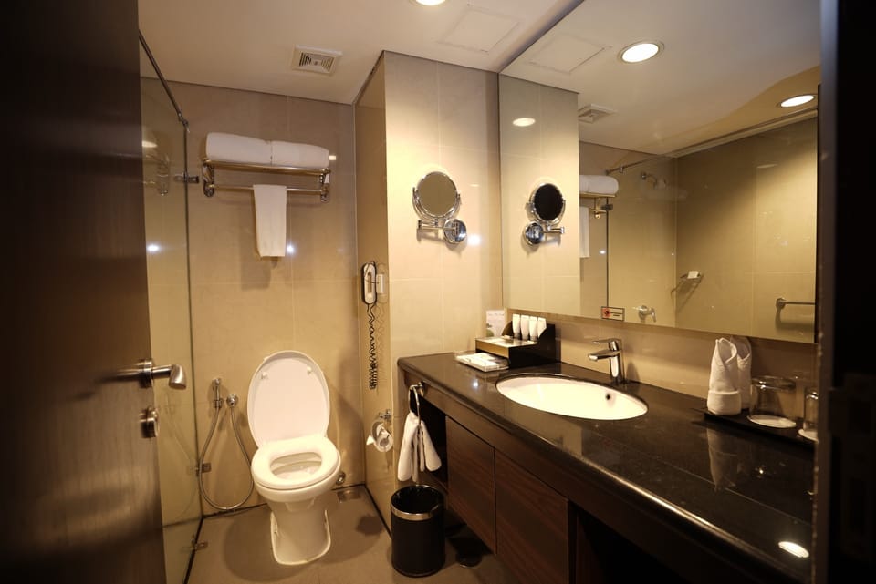 Shower, free toiletries, hair dryer, slippers