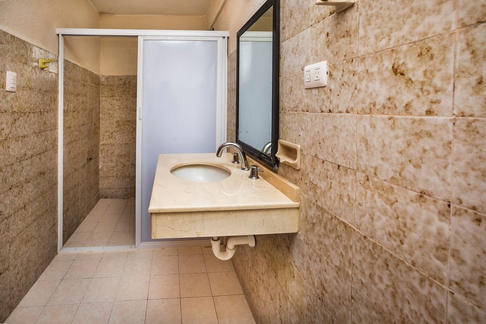 Standard Room, 2 Double Beds | Bathroom | Shower, free toiletries, towels, soap