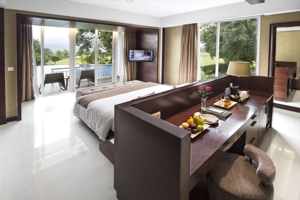 Grand Suite, Lagoon View | In-room safe, desk, blackout drapes, iron/ironing board